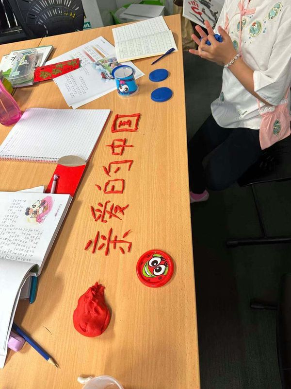 Paper-cutting craft session at Casey Foundation Chinese School